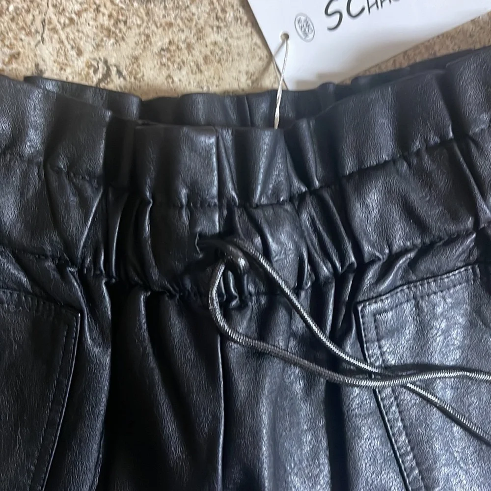 SCHHJZPJ size Medium pleather shorts. Black. Pockets. New!